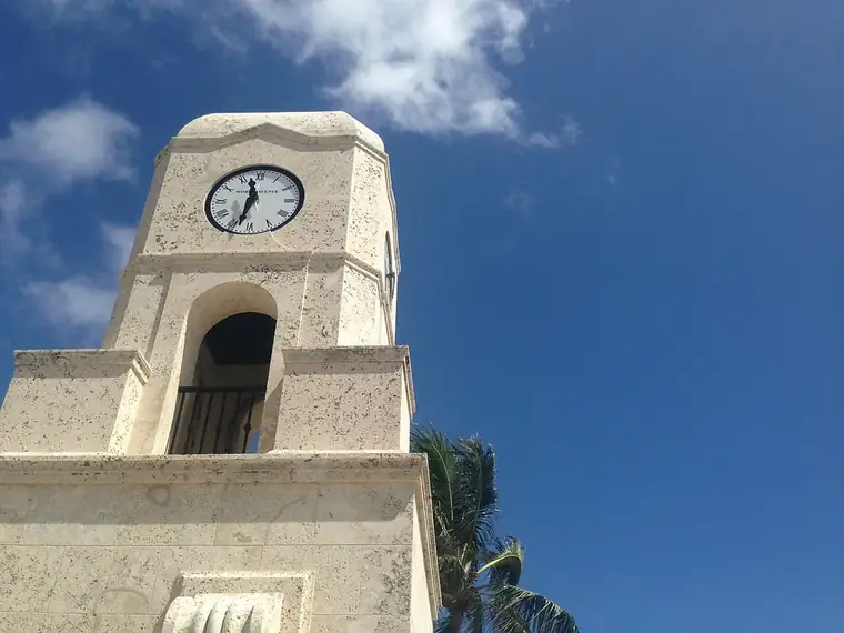 A clock tower in Palm Beach